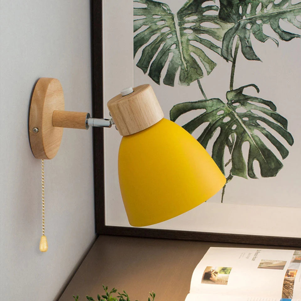 Cone Shade Wall Light - Yellow Shade Beside Mirror
