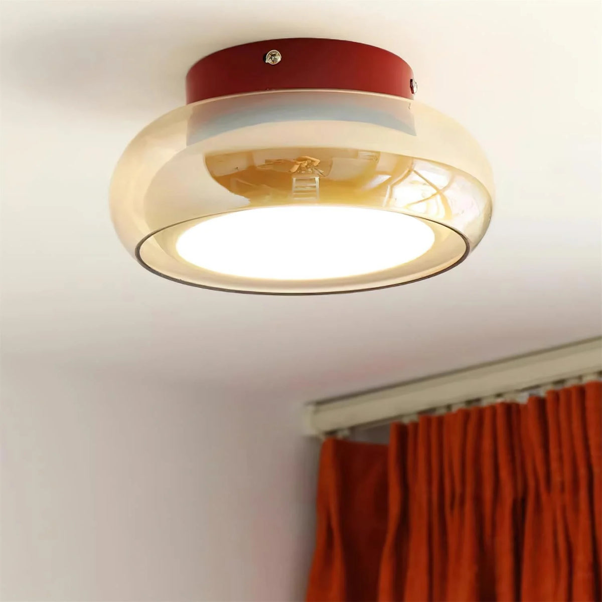 Retro Smoked Glass Flush Ceiling Light - Close-Up of Amber Glass Shade and Red Base