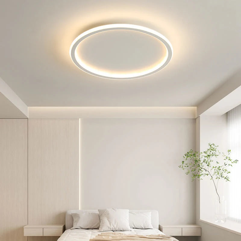 Ring LED Ceiling Light - White Ring Above Bed in Bright Bedroom