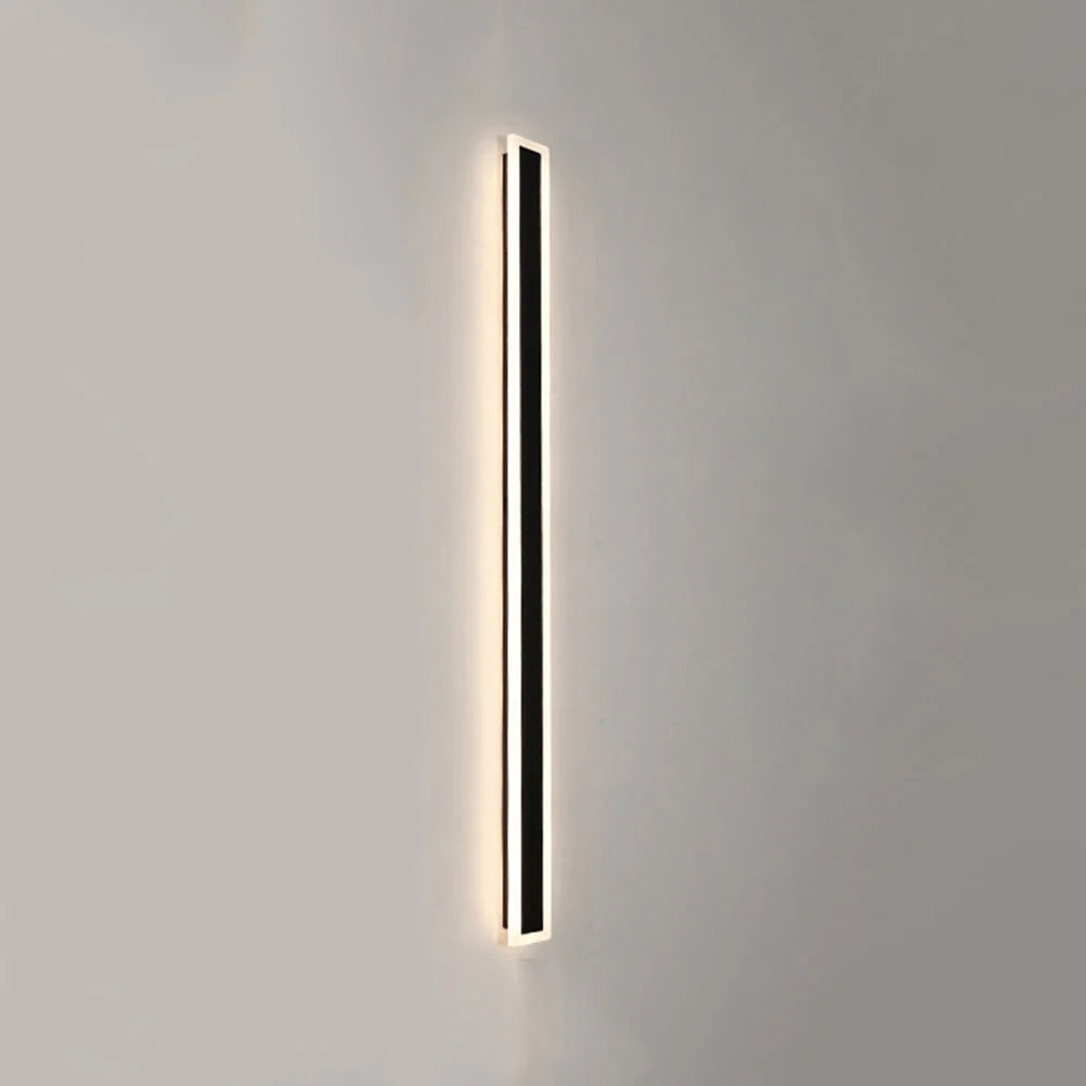 Slim Rectangular Outdoor Wall Light - Lit on Plain Wall