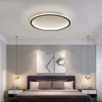 Round LED Flush Ceiling Light - Black Ring Above Bed
