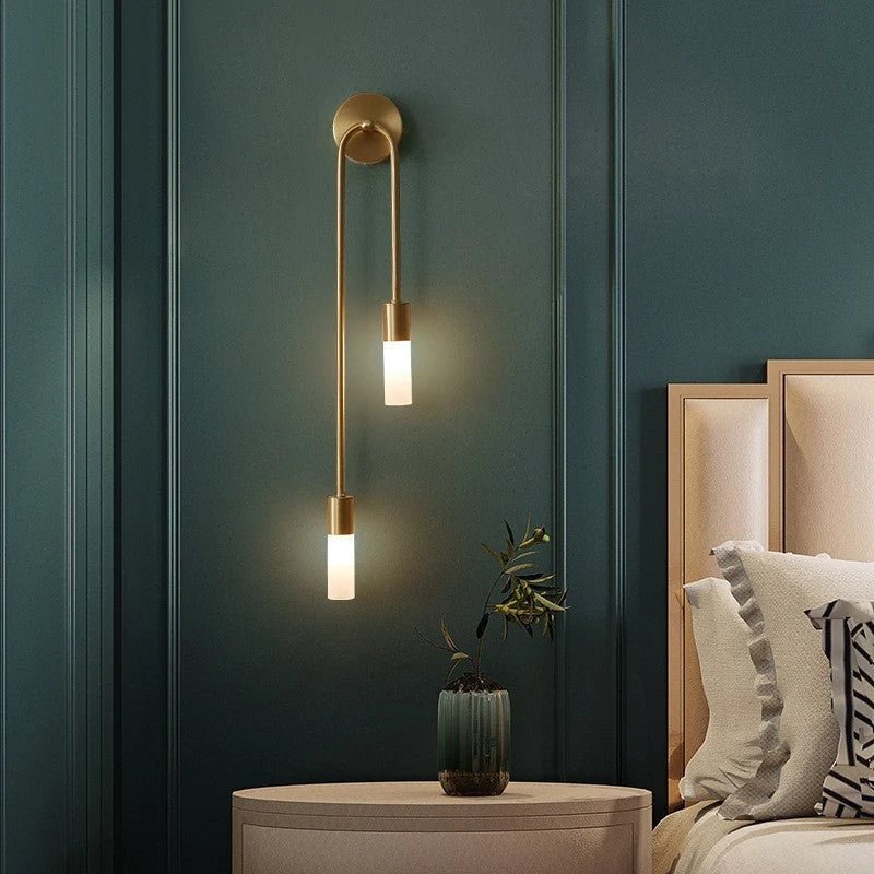 Linear Gold LED Wall Sconce - Above Bedside Table on Green Wall