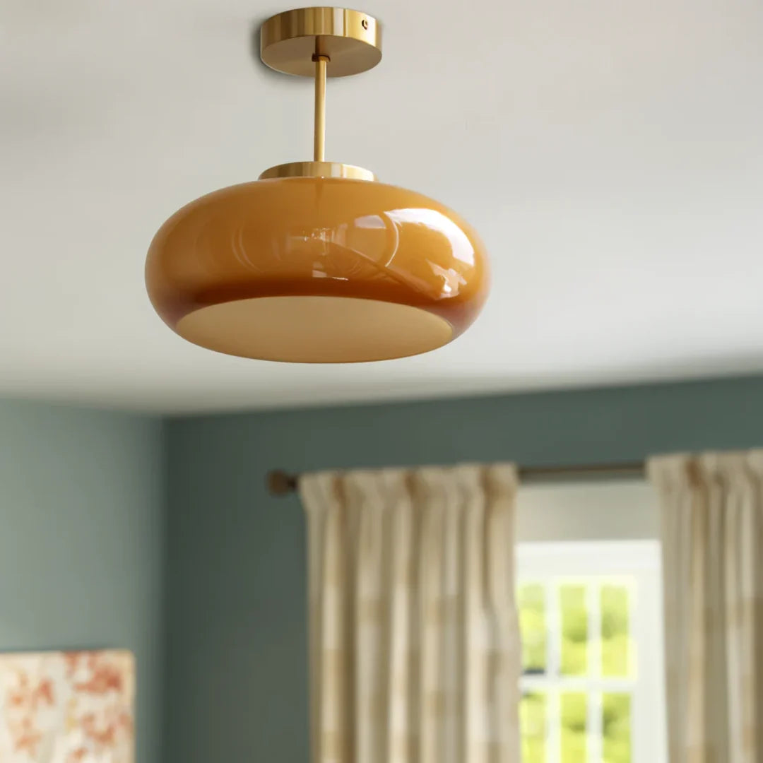 Rounded Glass Ceiling Light - Amber Glass Above Curtained Window