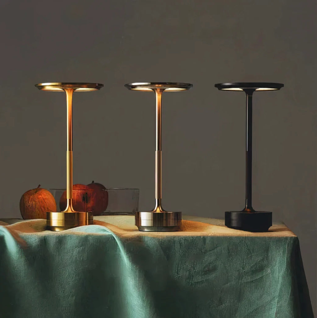 Cordless LED Table Lamp - Gold, Silver and Black Finishes on Table