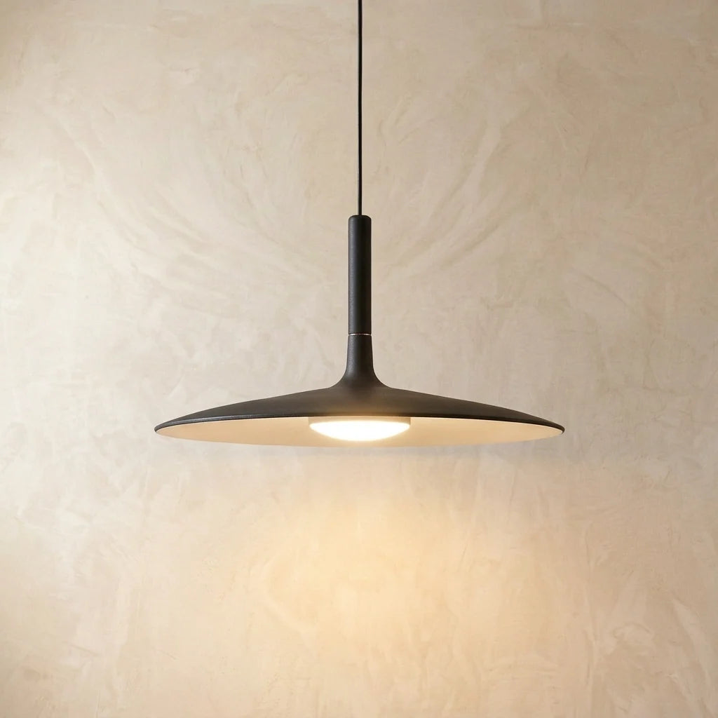 Slim Nordic Pendant Light - Black Shade, Lit on Plaster Wall