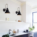 Mid-Century Wall Sconce with Cone Shade and Brass Arm - Two Black Sconces Above Kitchen Shelf