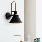 Mid-Century Wall Sconce with Cone Shade and Brass Arm - Black Shade Beside Window