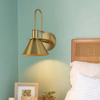 Mid-Century Wall Sconce with Cone Shade and Brass Arm - Brass Shade Above Bed