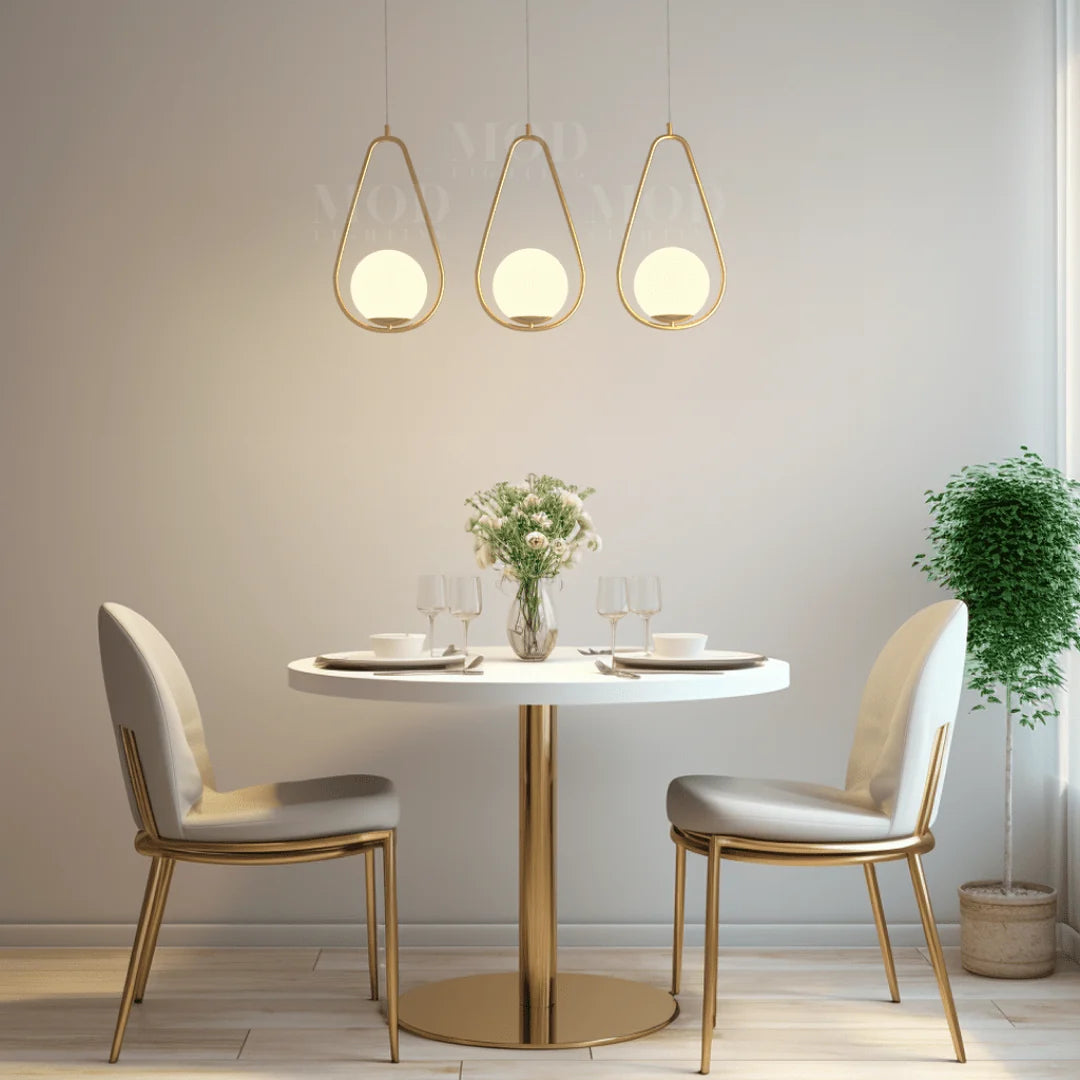 Opal Glass Cage Pendant Light - Three Gold Teardrop Pendants Above Dining Table