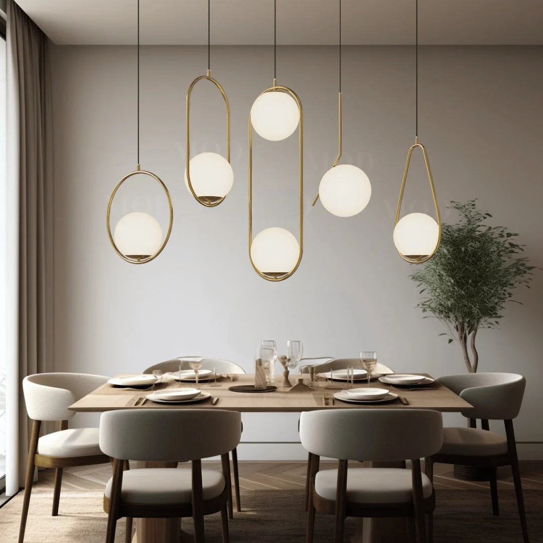 Opal Glass Cage Pendant Light - Mixed Gold Shapes Above Dining Table