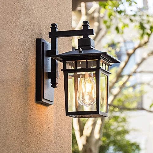 Clear Glass Outdoor Wall Lantern - Black Finish on Render Wall