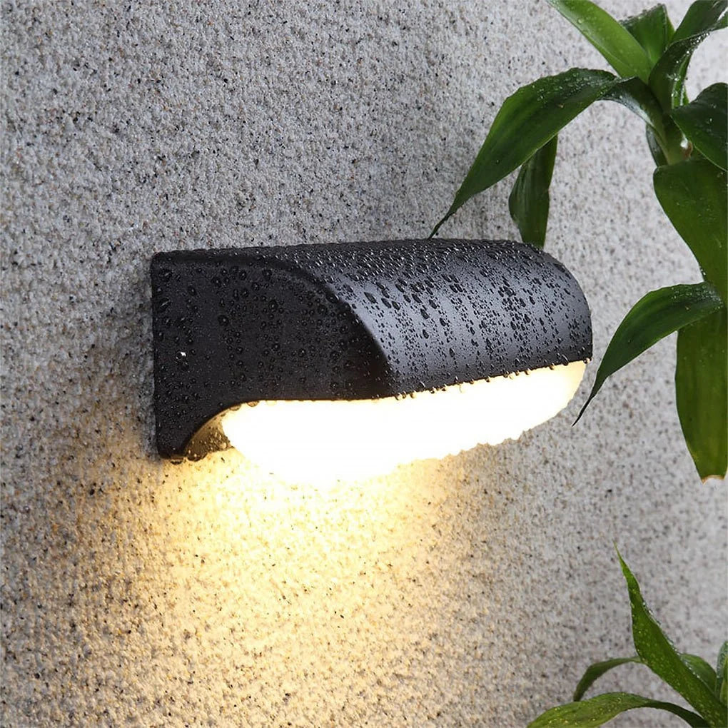 Modern Outdoor LED Wall Light - 1 Light Version with Raindrops