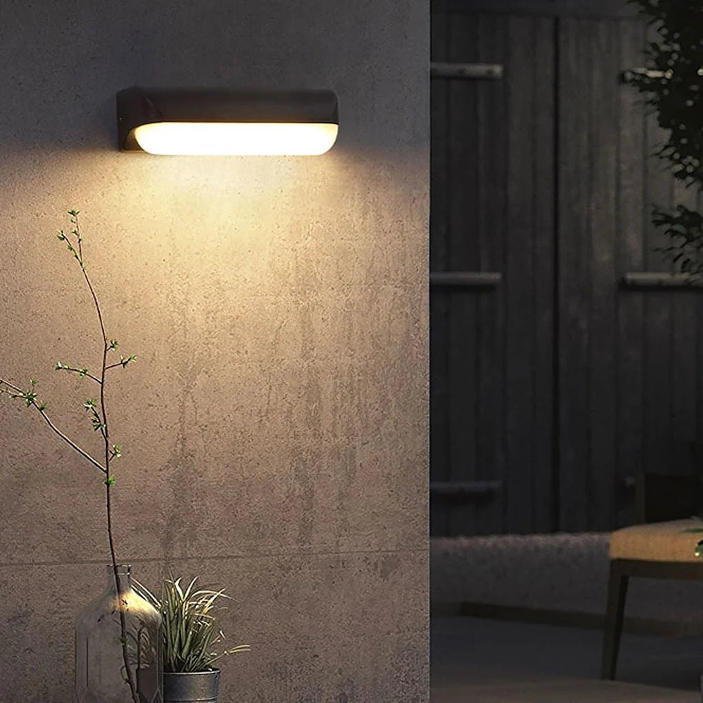 Modern Outdoor LED Wall Light - 1 Light Version on Concrete Wall