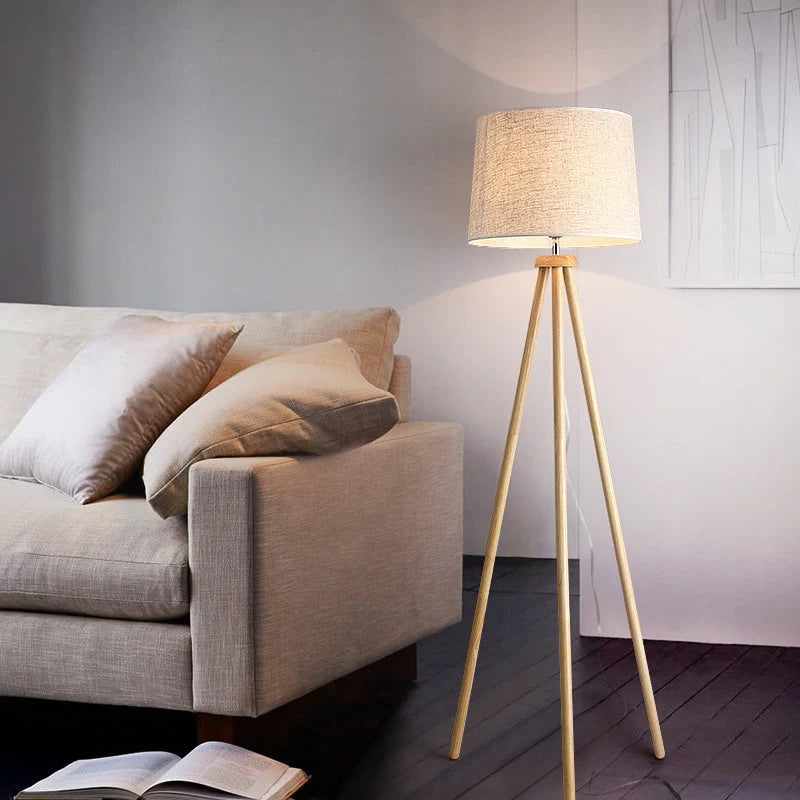 Wooden Tripod Floor Lamp with Linen Drum Shade - Beside Grey Sofa