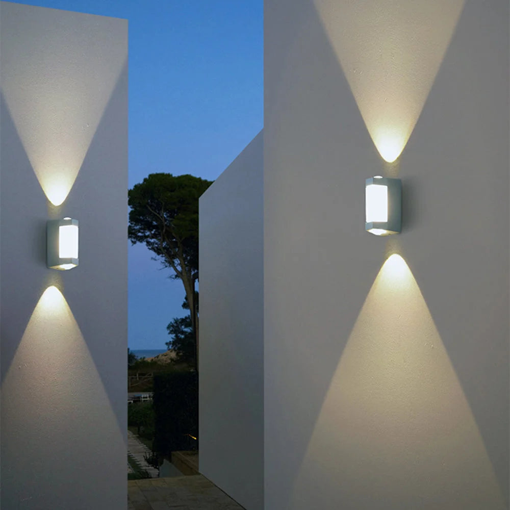 Up and Down Outdoor Wall Light - White Finish on Exterior Walls at Dusk