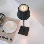 Cordless LED Table Lamp - Close-Up of Pleated Black Shade, Lit