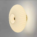 Ribbed Glass Disc Wall Sconce - Frosted White Glass, Lit Side View
