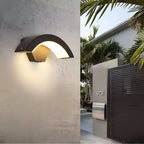 Modern Outdoor LED Wall Light - Lit Beside Gated Entrance