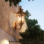 Ripple Glass Outdoor Wall Lantern - Bronze Finish on Stone Wall