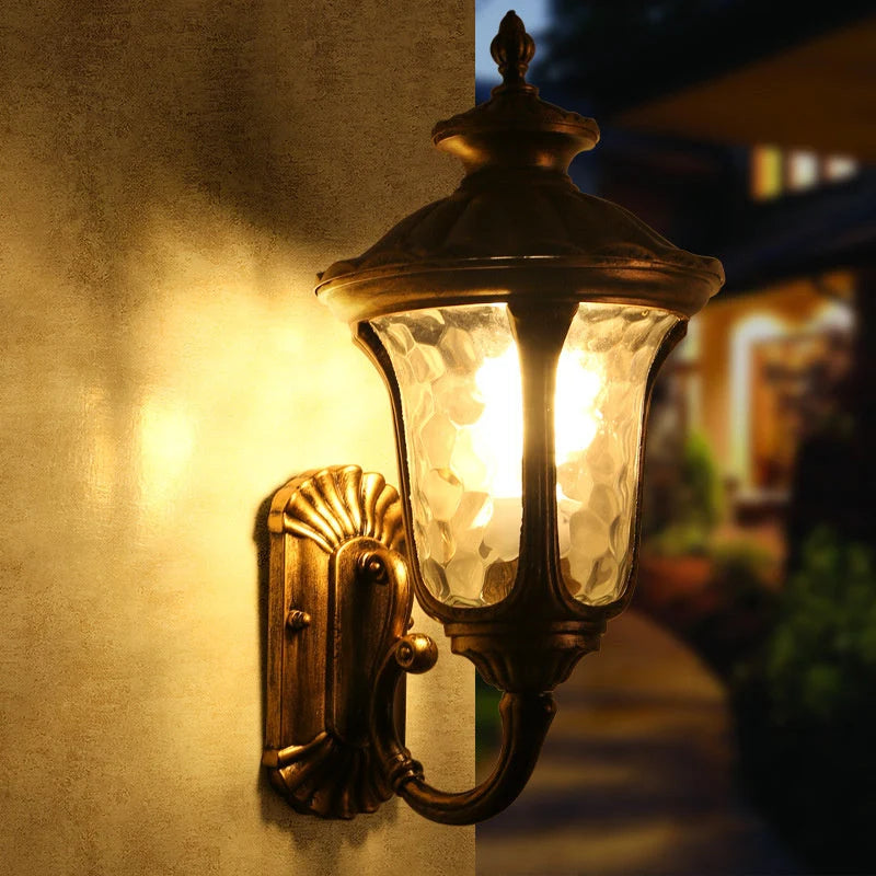 Ripple Glass Outdoor Wall Lantern - Bronze Finish Lit at Night