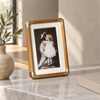 Solid Wood Tabletop Photo Frame with Brass-Tone Corners - On a Marble Shelf with Olive Branch