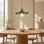 Floral Glass Pendant Light with Brass Fitting - Green Glass Above Round Dining Table