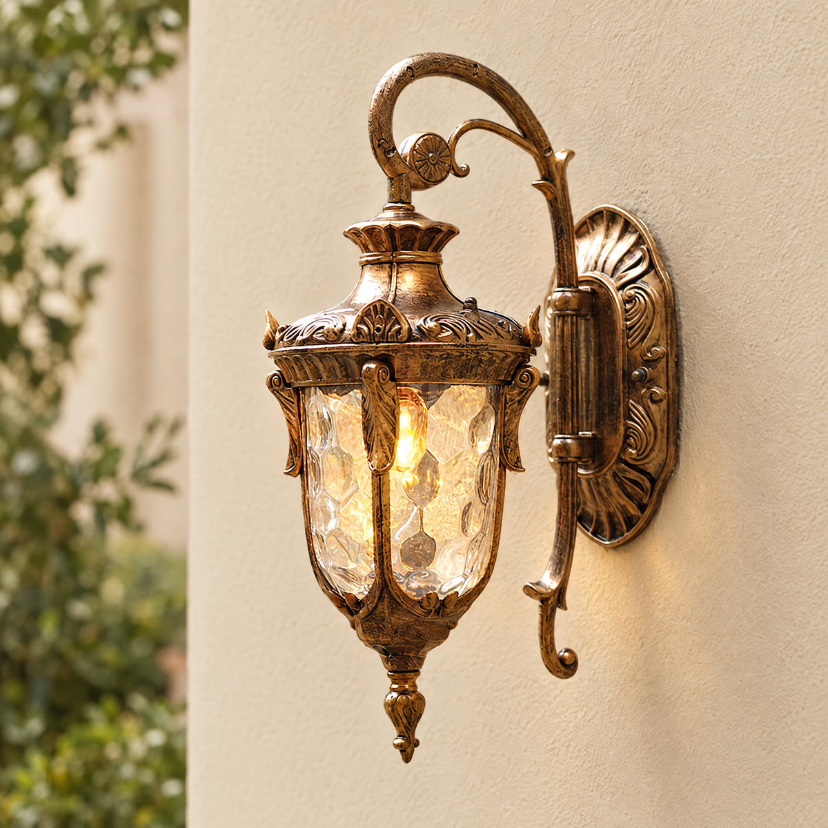 Vintage Outdoor Wall Lantern with Scroll Arm - Bronze Finish Lit on Cream Wall