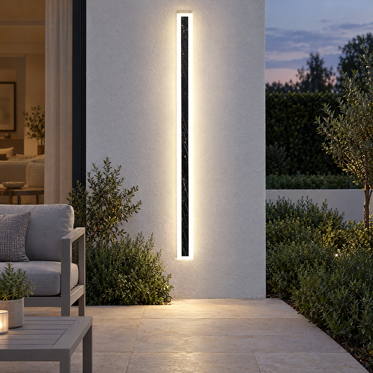 Slim Rectangular Outdoor Wall Light - Lit Beside Patio at Dusk
