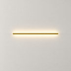Slim Linear LED Wall Light - Gold Finish on Plain White Wall