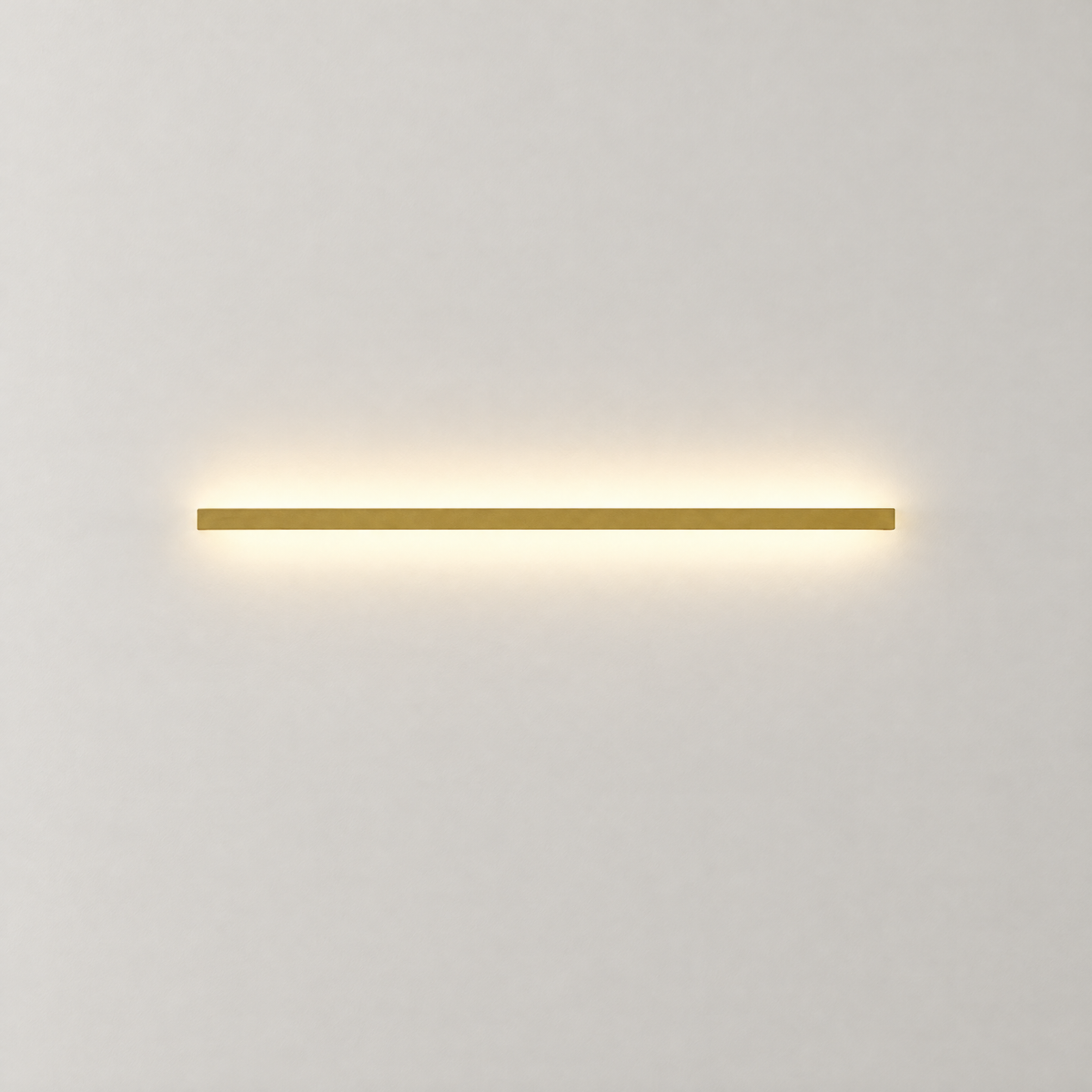 Slim Linear LED Wall Light - Gold Finish on Plain White Wall