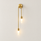 Linear Gold LED Wall Sconce - Lit on Off-White Wall
