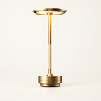 Cordless LED Table Lamp - Gold Finish, Lit, on Off-White Background