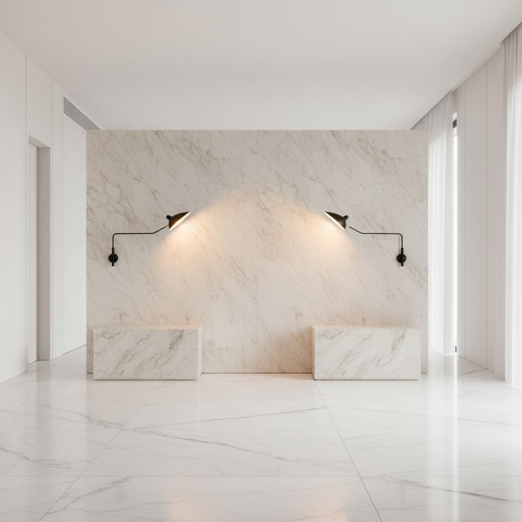 Lorvali industrial black double arm wall sconces mounted on a marble wall in a modern minimalist interior