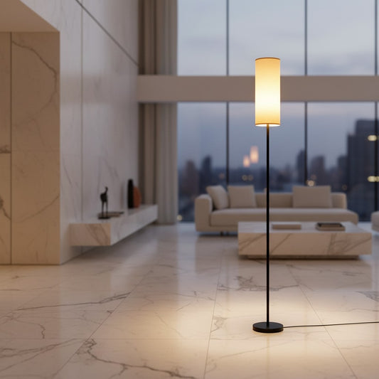 Lorvali mid-century floor lamp with a slim black iron post and a warm glowing linen shade in a modern living room.