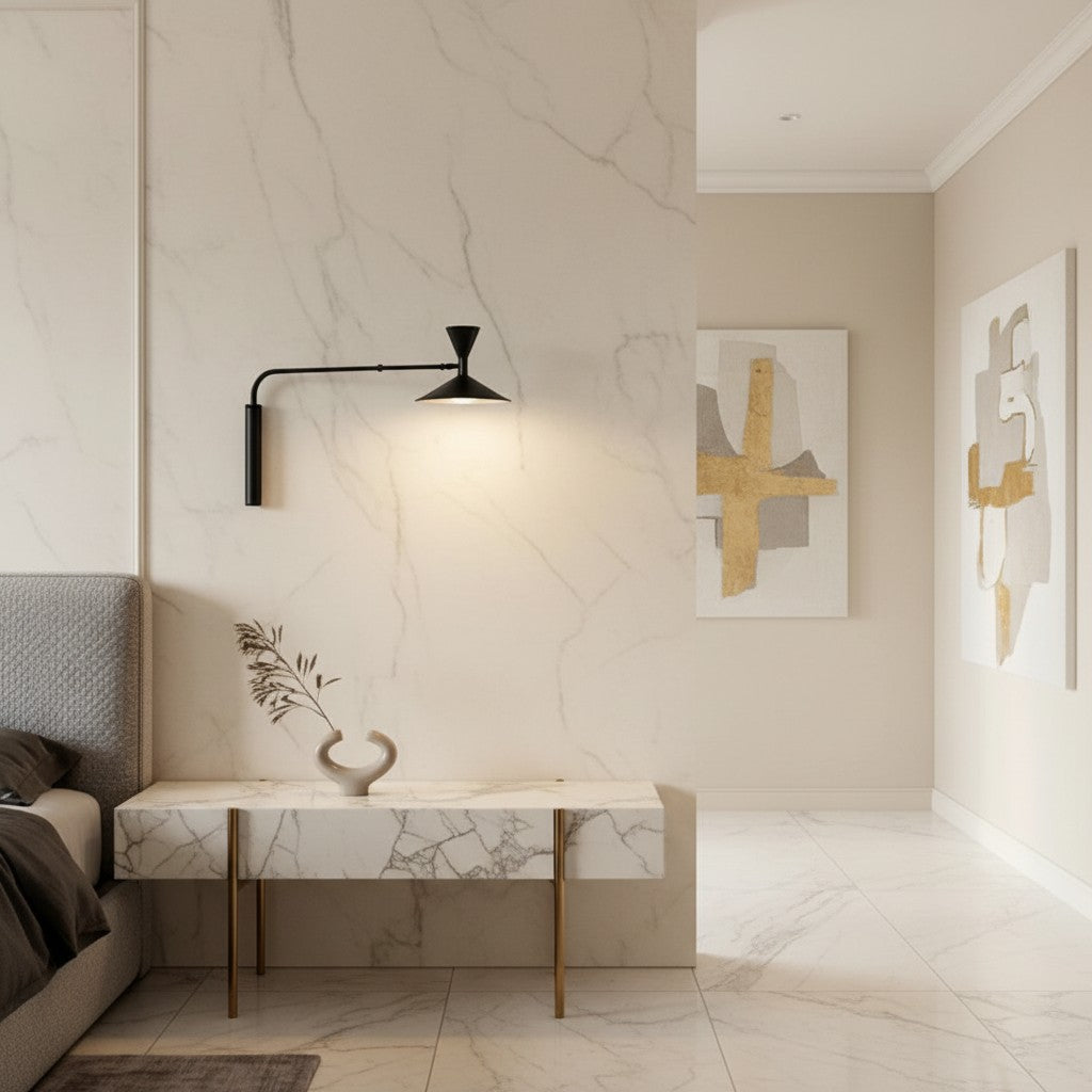 Lorvali modern black double-joint swing arm wall sconce with dual horn-shaped shades mounted in a luxury bedroom.