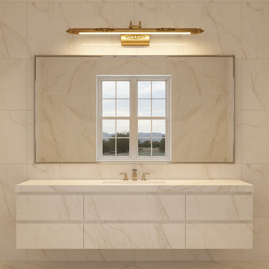 Lorvali brass bathroom vanity light fixture with an acrylic shade mounted above a mirror in a marble-tiled bathroom.