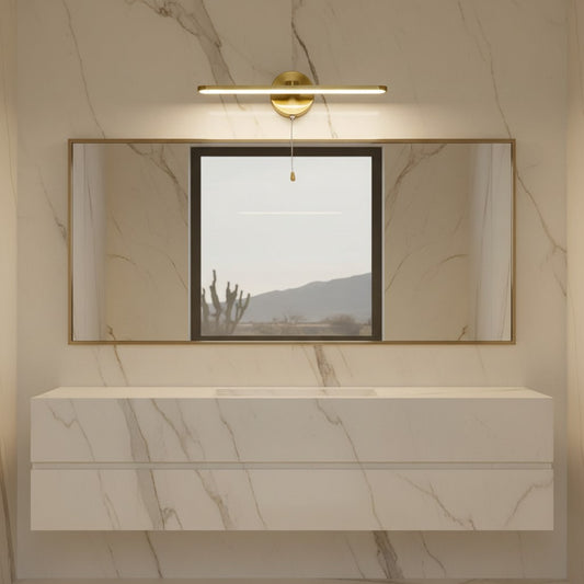 Lorvali modern linear LED vanity light in yellow bronze with a pull rope switch mounted above a bathroom mirror.