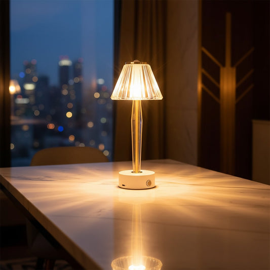 Lorvali classic table lamp with a white iron base and acrylic shade, featuring warm LED light on a marble table.