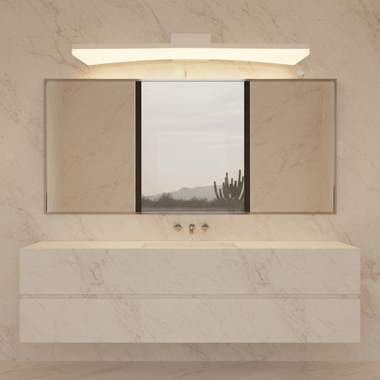 Lorvali modern curved linear LED vanity light in matte white mounted above a bathroom mirror on marble wall