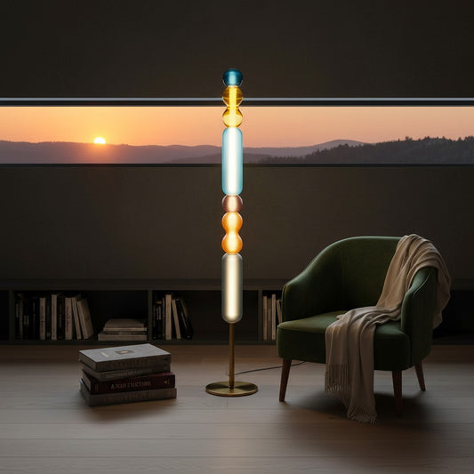 Lorvali Drift Glass Floor Lamp with stacked colorful glass spheres and gold metal base in a modern living room.