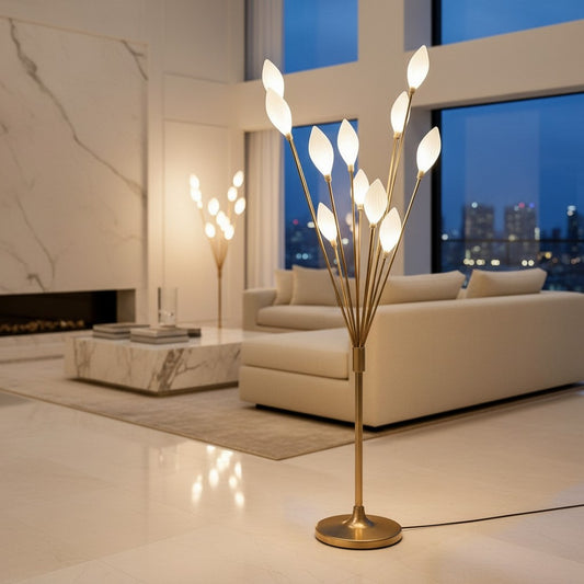 Lorvali gold iron floor lamp with white olive-shaped lights in a modern living room setting for wedding decor.