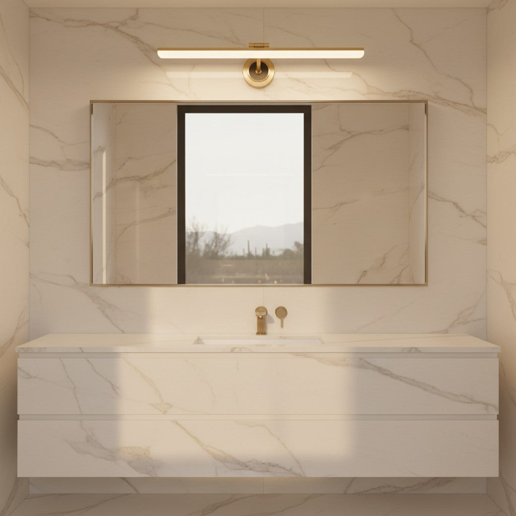 Lorvali modern gold LED vanity light bar mounted above a rectangular mirror in a marble bathroom