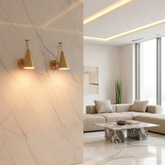 Lorvali gold adjustable swing arm wall sconces mounted on a marble wall in a modern minimalist living room