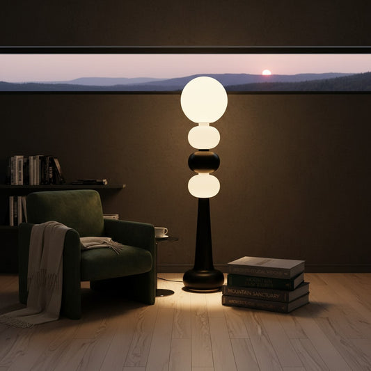 Lorvali Kabin floor lamp with a modern geometric black and white resin design in a cozy living room setting.