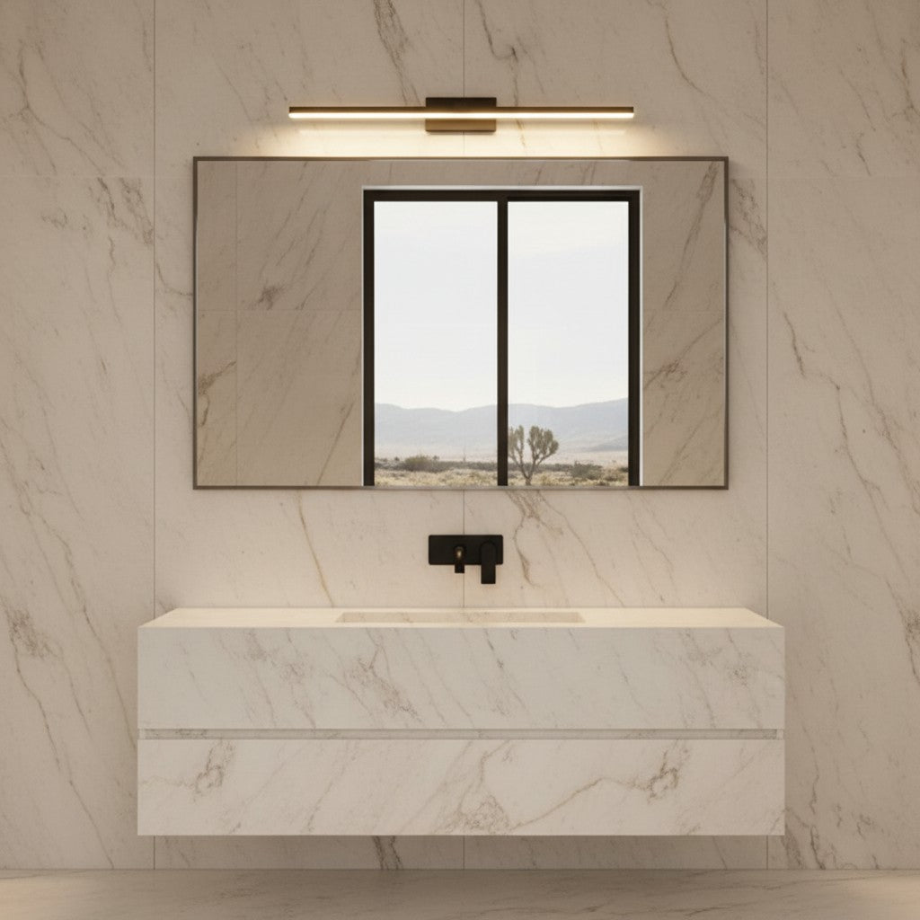 Lorvali modern minimalist linear LED vanity light mounted above a bathroom mirror on a marble wall.