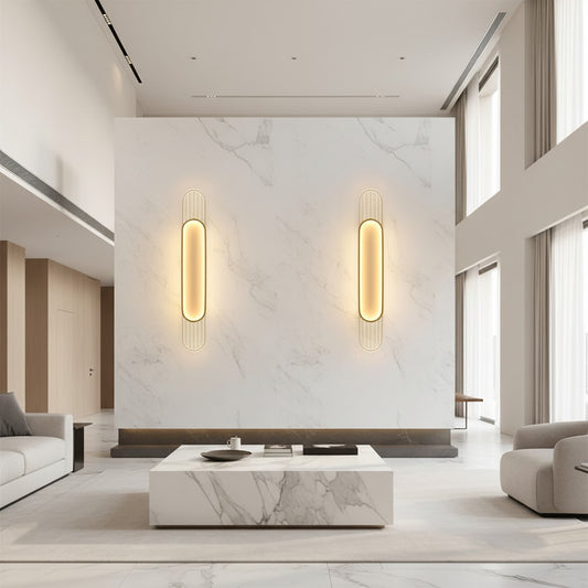Lorvali modern linear LED wall lights with warm glow mounted on a white marble living room accent wall