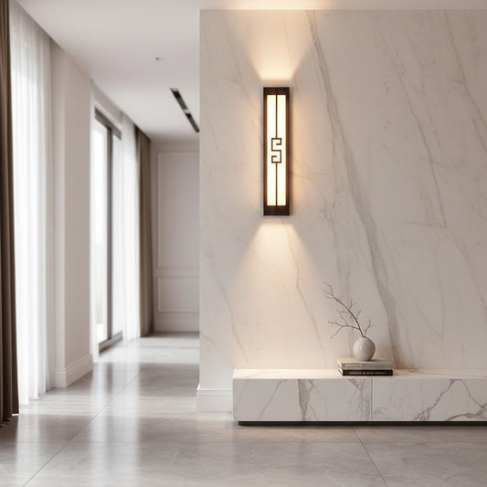 Lorvali contemporary linear wall sconce with a black copper frame and white marble shade featuring a meander pattern.