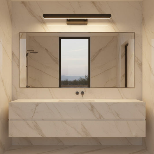Lorvali minimalist matte black LED vanity light bar mounted above a bathroom mirror with marble wall tiles.