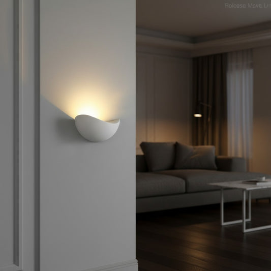 Lorvali modern minimalist white frosted glass LED wall sconce with a unique geometric shape casting warm light