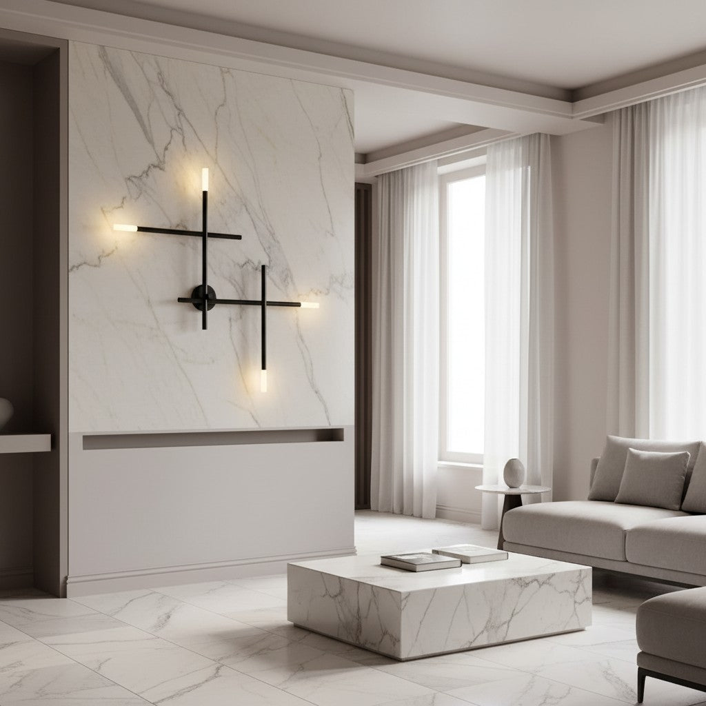 Lorvali modern cross-shaped LED wall sconce with black iron frame and acrylic shades mounted on a marble wall.
